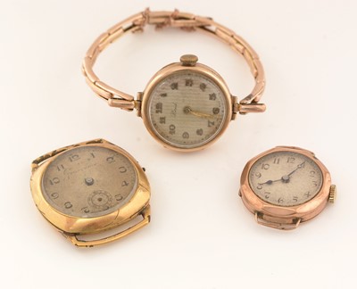 Lot 172 - Two gold cased watches and another.