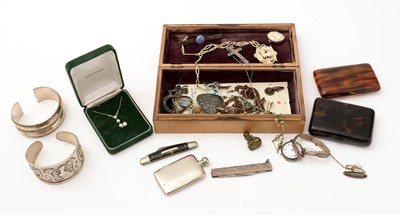 Lot 149 - An Egyptian silver bangle, and another bangle and other items.