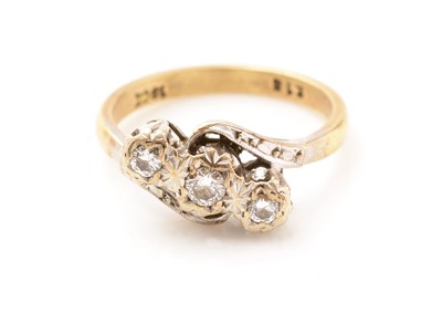 Lot 162 - A three stone diamond ring