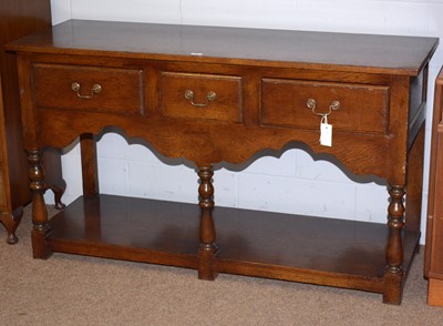 Lot 53 - An 18th Century style ‘stressed oak’ dresser.