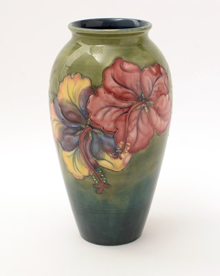 Lot 411 - Moorcroft Hibiscus pattern vase.