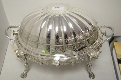 Lot 472 - A silver plated twin handled warming plate