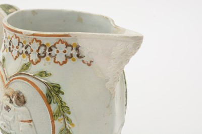 Lot 706 - Three Prattware jugs