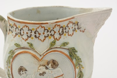 Lot 706 - Three Prattware jugs