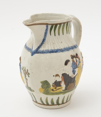 Lot 706 - Three Prattware jugs