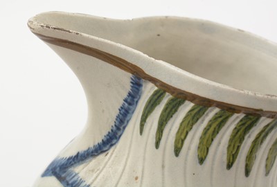Lot 706 - Three Prattware jugs