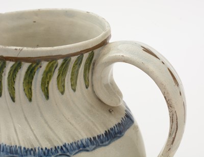 Lot 706 - Three Prattware jugs