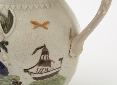 Lot 706 - Three Prattware jugs