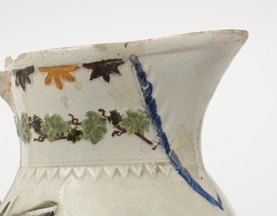 Lot 706 - Three Prattware jugs