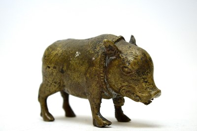 Lot 399 - A Chinese bronze figure of a pig.