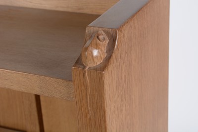 Lot 1272 - Workshop of Robert ‘Mouseman’ Thompson (Kilburn): an oak open bookcase.