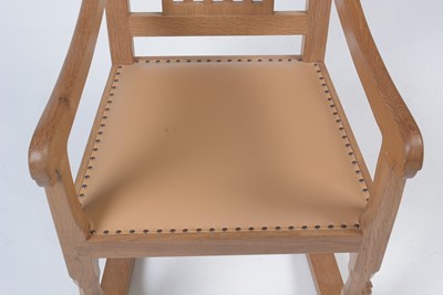 Lot 1279 - Workshop of Robert 'Mouseman' Thompson (Kilburn): oak rocking chair.