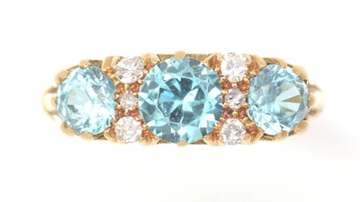 Lot 425 - A diamond and zircon ring