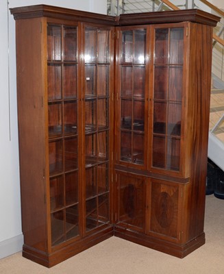 Lot 78 - A Victorian-style mahogany two-piece corner bookcase.