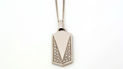 Lot 434 - An 18ct white gold and diamond pendant