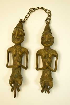 Lot 470 - A pair of Edan Ogboni staffs/rods
