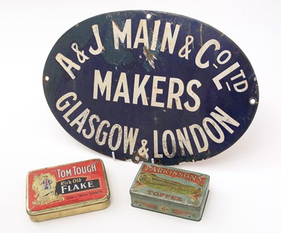 Lot 537 - An enamel sign and two tins
