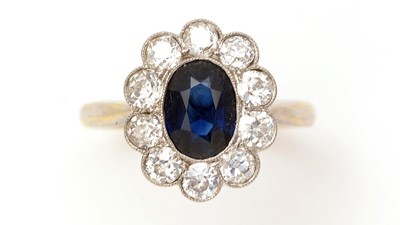 Lot 441 - A sapphire and diamond cluster ring