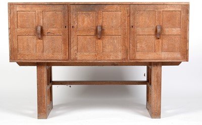 Lot 339 - A 1930s oak sideboard by Boosbeck Industries.
