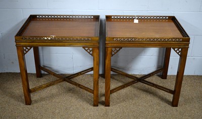 Lot 10 - A pair of substantial mahogany occasional tables.
