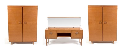 Lot 317 - A mid 20th Century teak three-piece bedroom suite.