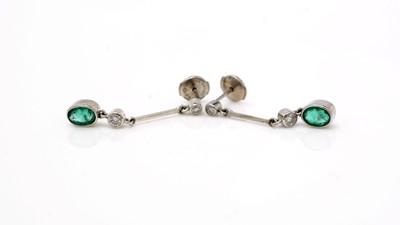 Lot 469 - A pair of emerald and diamond earrings