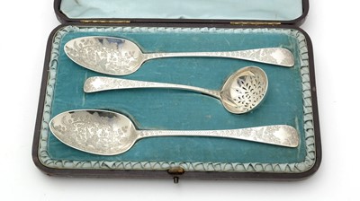 Lot 577 - A set of early 19th Century fruit spoons and sifter