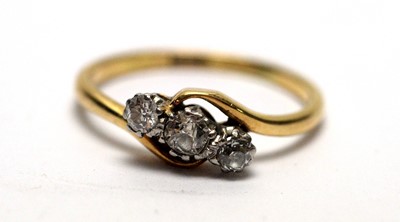 Lot 174 - A three stone diamond ring