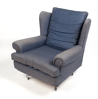 Lot 394 - A mid Century swivel armchair.