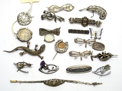 Lot 129 - A selection of silver and other brooches