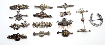 Lot 121 - A collection of silver and other brooches