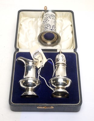 Lot 169 - Silver jug and caster set and another caster.