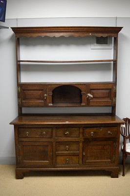 Lot 79 - A substantial oak dresser, Georgian and later.