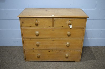 Lot 10 - A Victorian stripped pine chest.