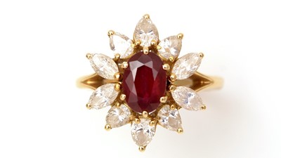 Lot 470 - A ruby and diamond cluster ring