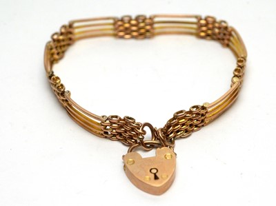 Lot 173 - An Edwardian 9ct yellow gold gate link bracelet