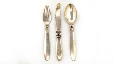 Lot 618 - Georg Jensen, Denmark: a silver knife, fork and spoon set