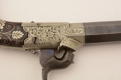 Lot 761 - A cased pair of 19th Century percussion pistols, by Smith