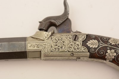 Lot 761 - A cased pair of 19th Century percussion pistols, by Smith