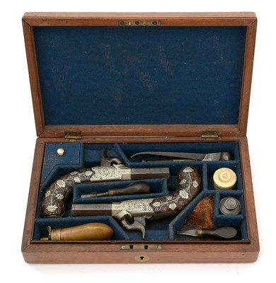Lot 761 - A cased pair of 19th Century percussion pistols, by Smith