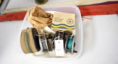 Lot 257 - A selection of fishing rods and reels.
