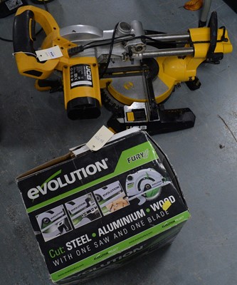 Lot 494 - A JCB SCMS210 sliding mitre saw; and a circular saw