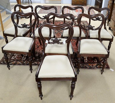 Lot 47 - A set of eight early Victorian mahogany balloon back dining chairs.