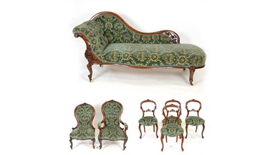 Lot 1348 - A Victorian carved walnut harlequin seven-piece salon suite.