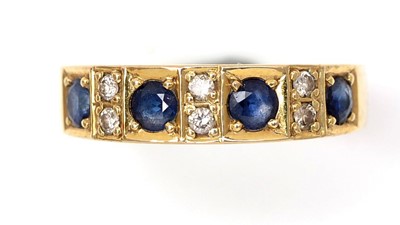 Lot 478 - A sapphire and diamond half-hoop eternity ring