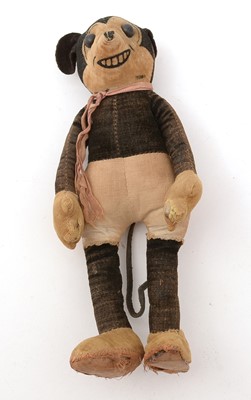 Lot 422 - A Walt Disney Productions Mickey Mouse felt soft toy.