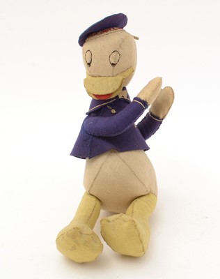 Lot 432 - A mid 20th Century Walt Disney Donald Duck felt soft toy.