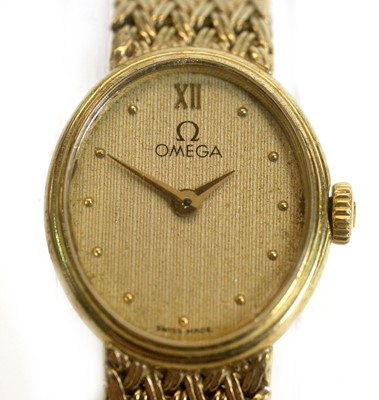 Lot 541 - Omega: a 9ct yellow gold cocktail watch