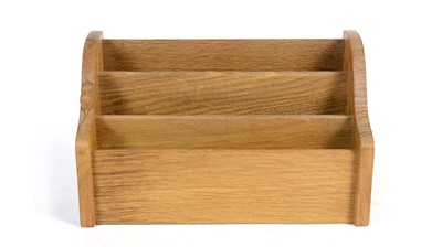 Lot 1269 - Workshop of  Robert ‘Mouseman’ Thompson (Kilburn): an oak stationery/letter rack.