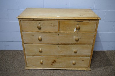 Lot 12 - A Victorian stripped pine chest.